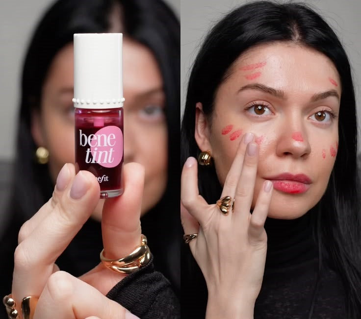 Benetint liquid cheek and lip stain lifestyle image – model holding bottle and applying pink-red tint on cheek