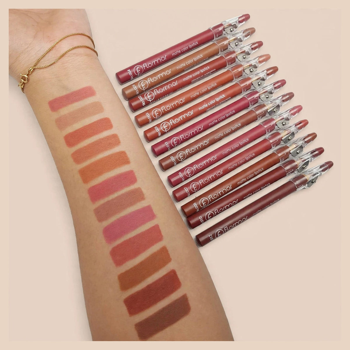 Flormar 12 pcs Matte Color Lipstick Lip Liner set with clear sharpener caps No 401-412 - arm swatches showing nude brown pink red shades - long lasting waterproof matte lip liners Pakistan
