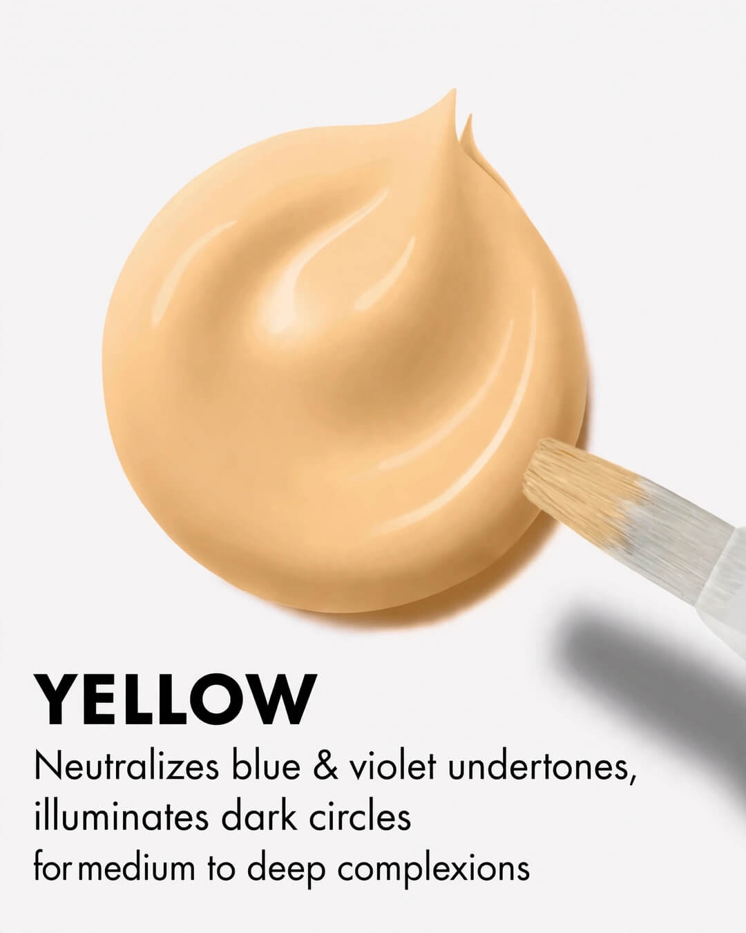 LA Girl GC991 Yellow Corrector creamy dollop swatch texture with brush - Close-up of LA Girl HD Pro Conceal Yellow Corrector beige-yellow dollop showing rich creamy pigment that neutralizes blue violet undertones and illuminates dark circles for medium to deep complexions in Pakistan, opaque lightweight coverage YELLOW Neutralizes blue violet undertones illuminates dark circles for medium to deep complexions best yellow swatch Pakistan